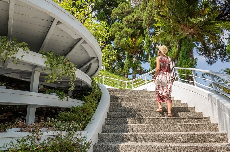 Woman walking at a stairs.