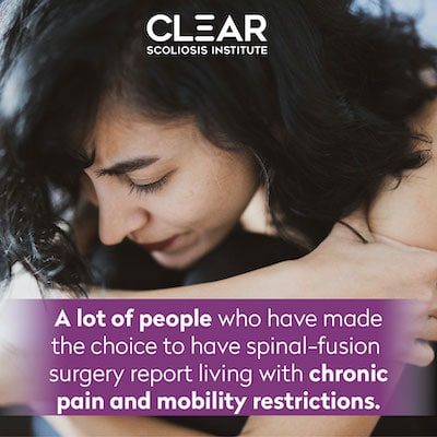 Woman in pain from spinal fusion